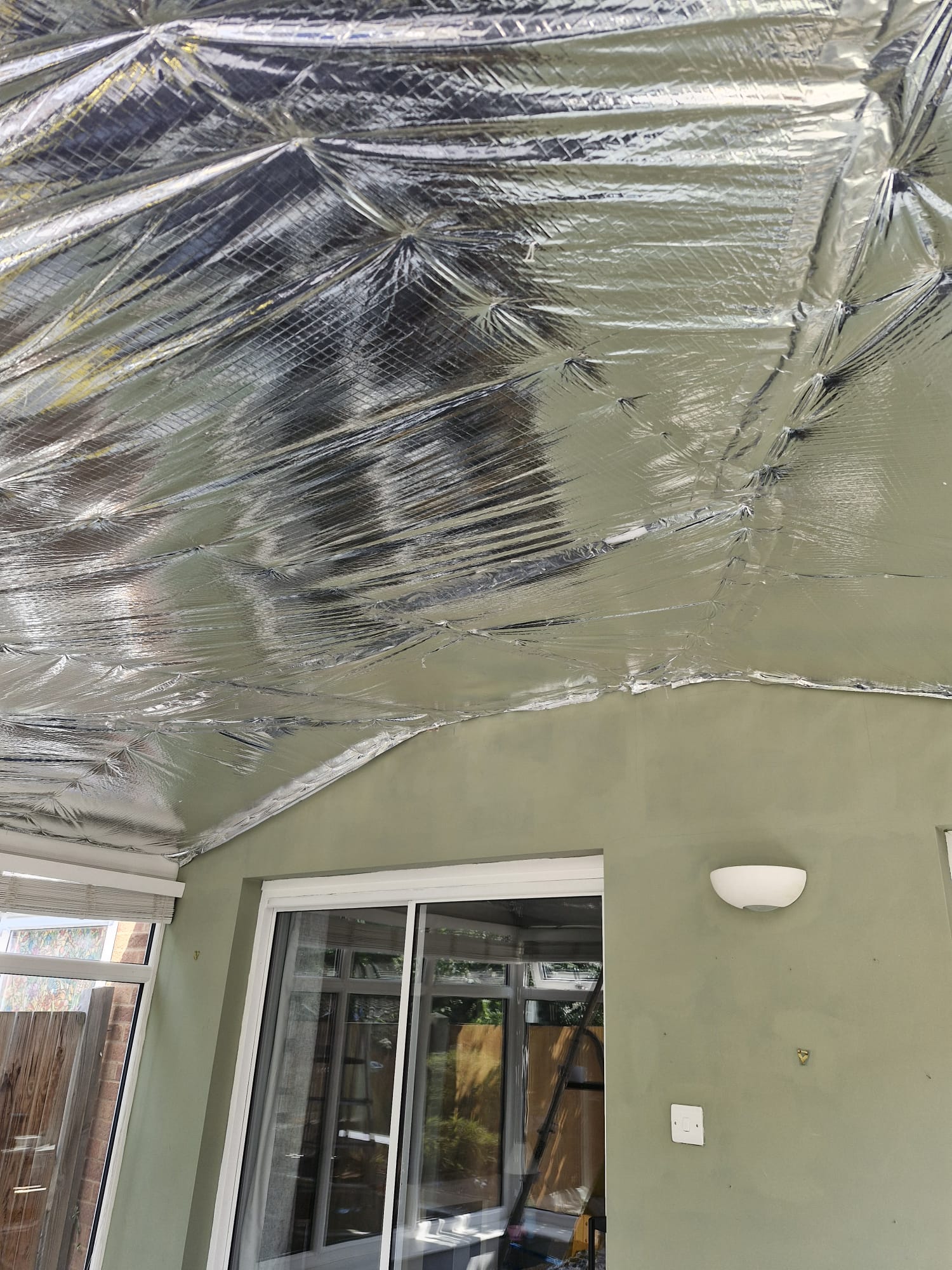 Full multifoil insulation coverage across conservatory roof