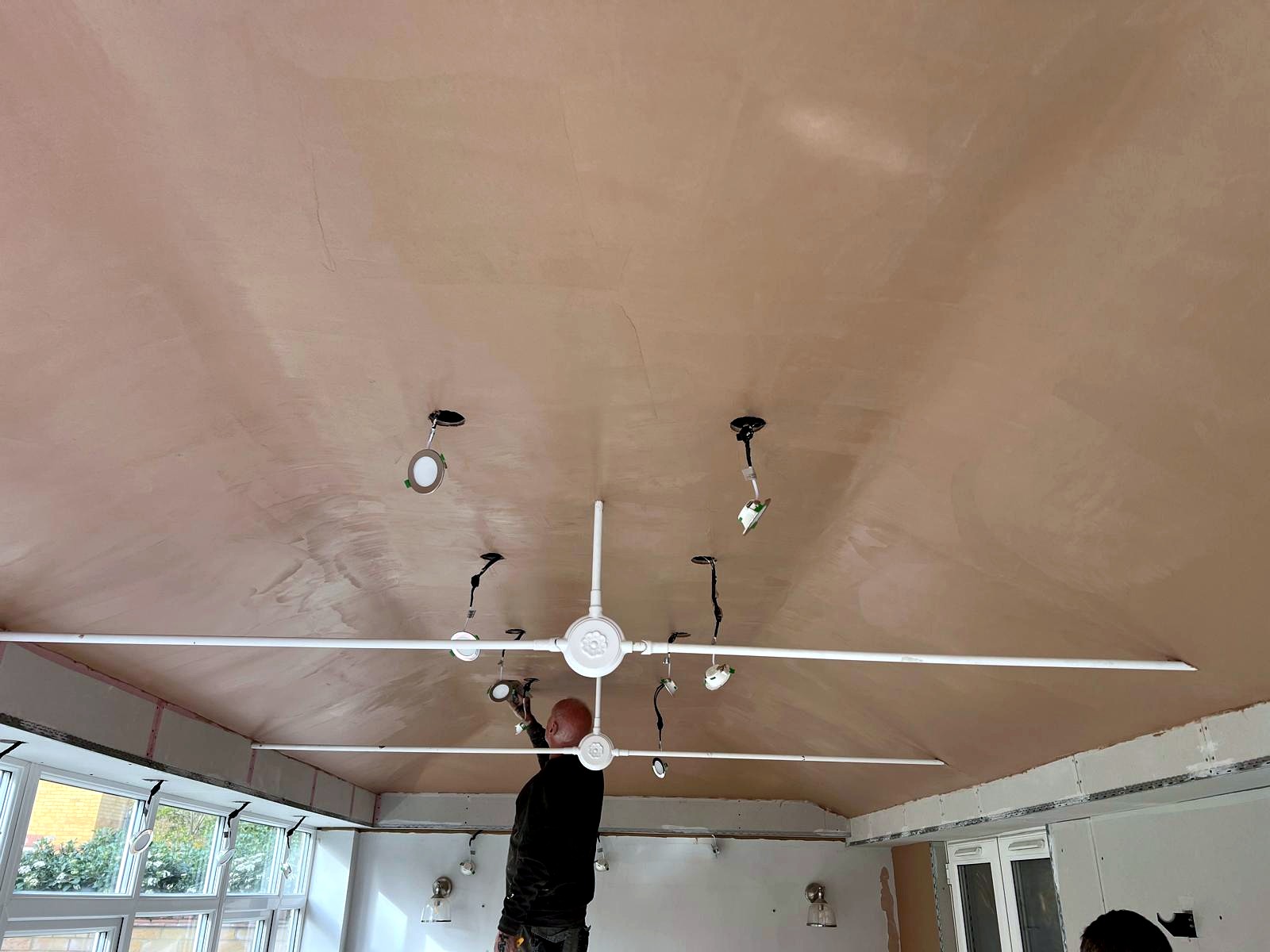 Fresh plaster applied to ceiling